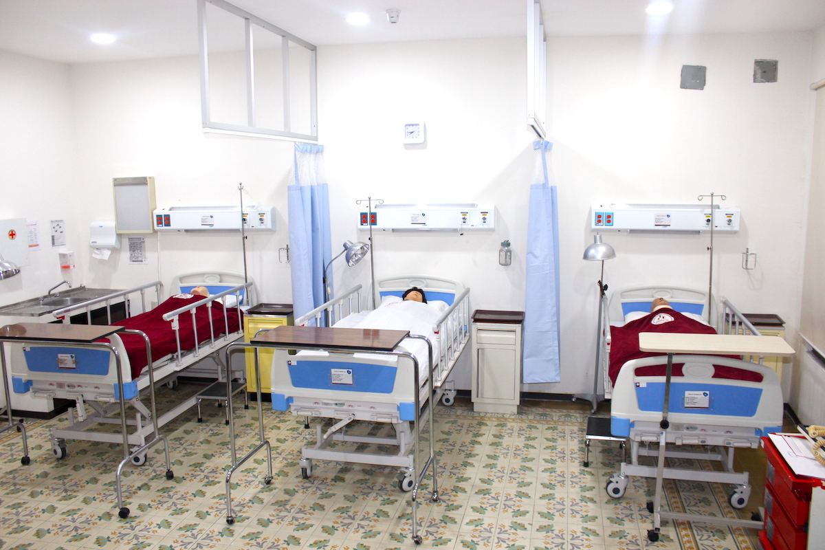 Camas de hospital con dummies